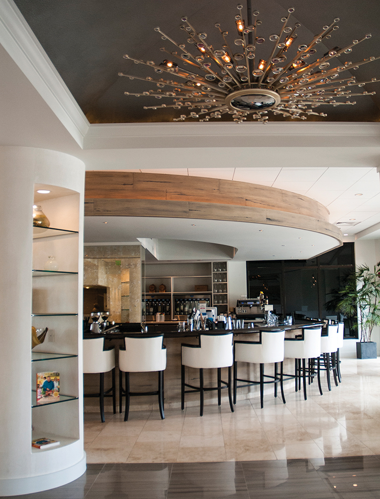 Bar at 1550 South overlooking Naples Marina. Photography by 1500 South