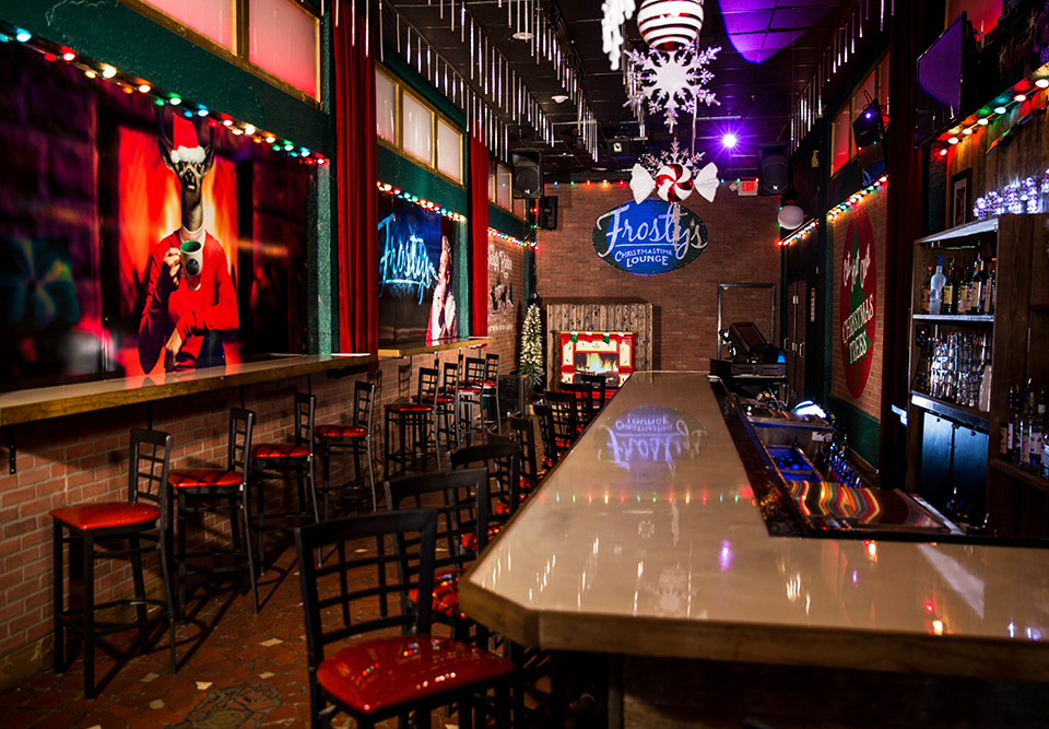 Enjoy a cocktail over a snowcone at the lower bar at Frosty's Christmas Lounge; Photography by Corey Besteder