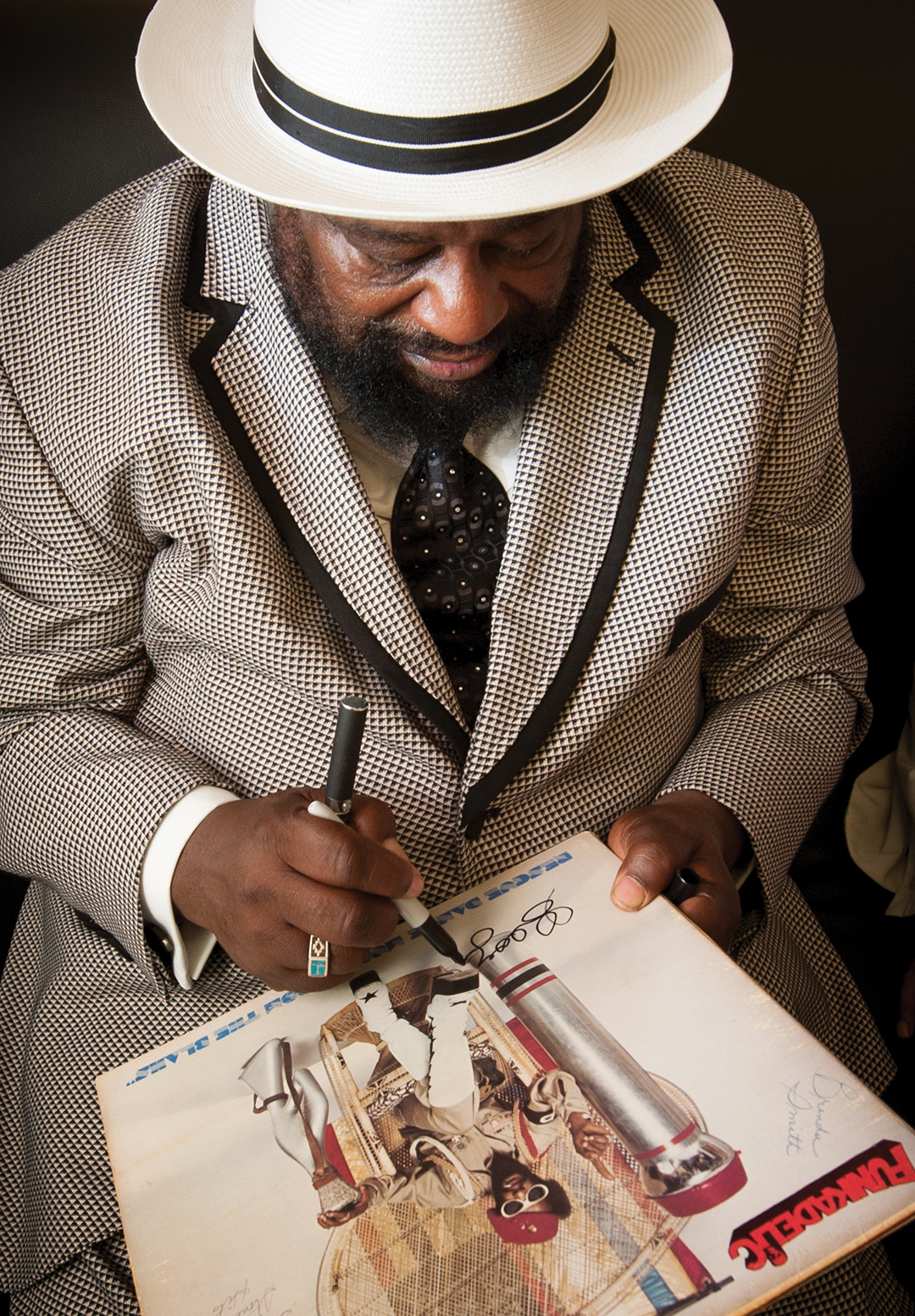 George Clinton signing one of his records