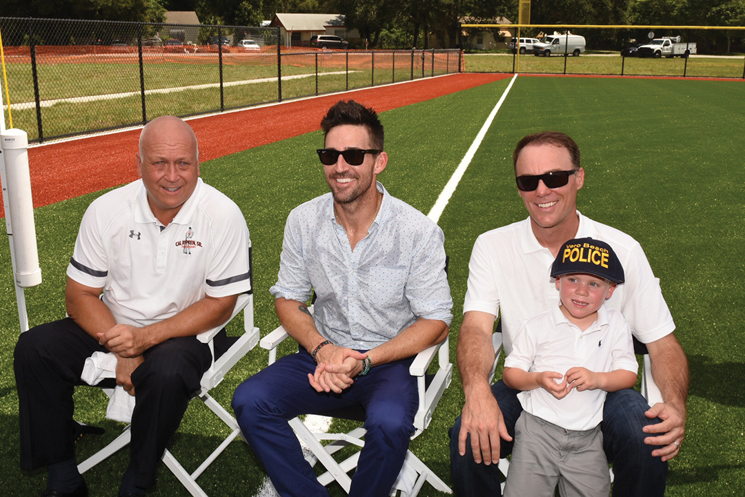 Owen with Cal Ripken Jr. and NASCAR driver Kevin Harvick at the ribbon cutting of Jake Owen Field, which serves the youth of Vero Beach