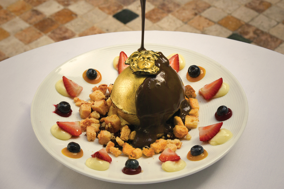 A dessert from the Villa Casa Casuarina restaurant is drizzled with chocolate. 