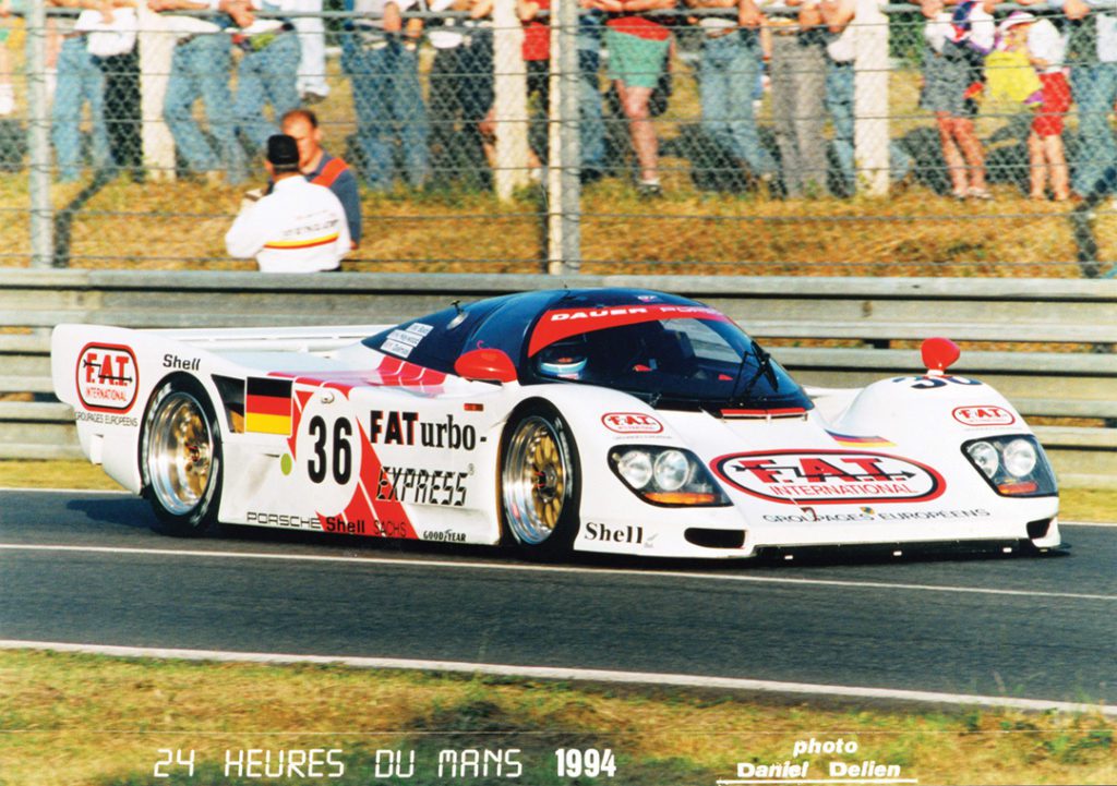 Haywood in a white car with various ads. It doesn't have the stripes of his earlier car.