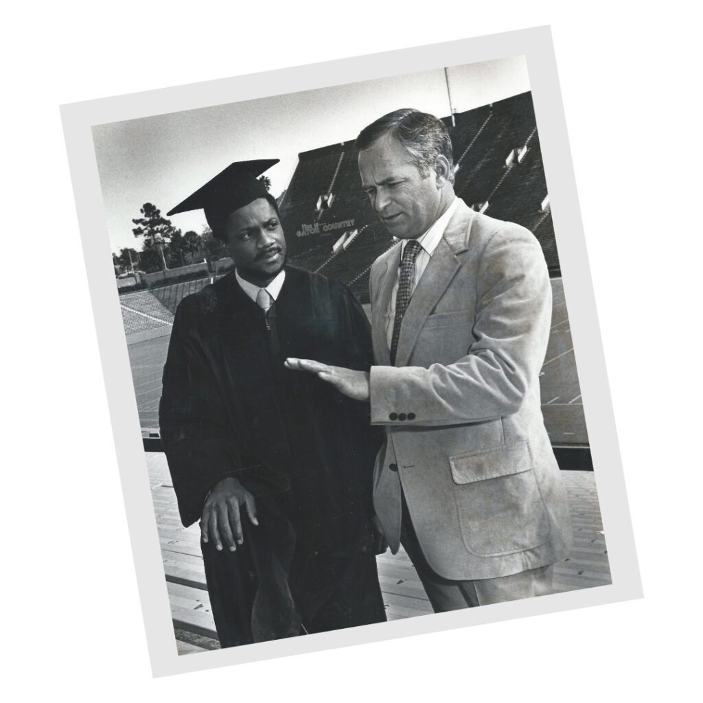 Leonard George in a cap and gown at UF.