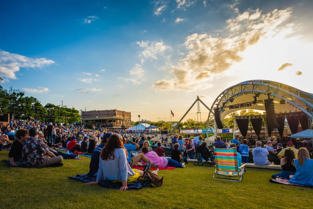 A crowd watches a performance at Tallahassee's Cascades Park.
