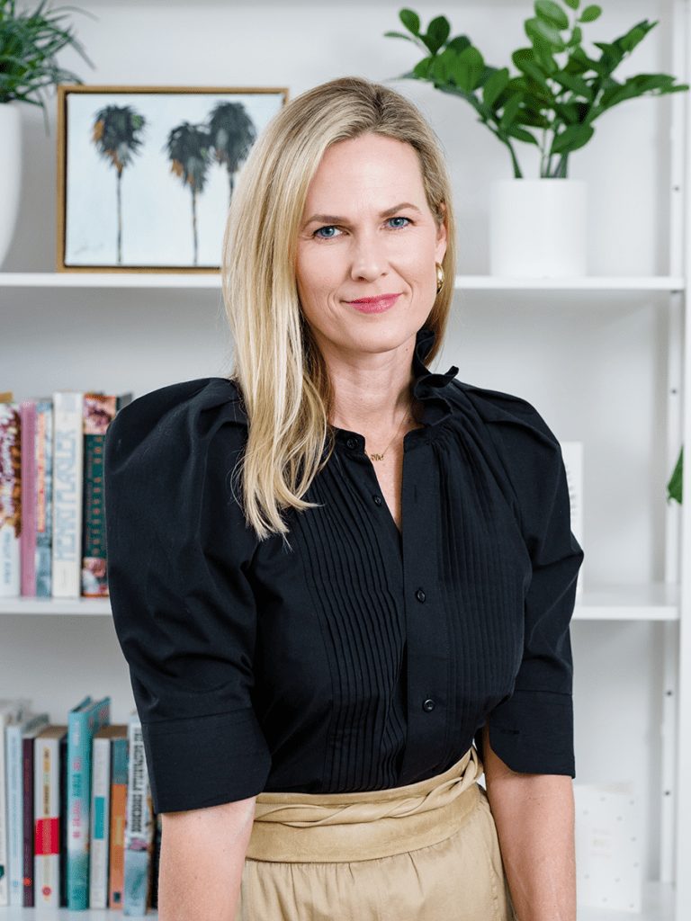 Flamingo Magazine Editor in Chief, Jamie Rich, poses in her office in Jacksonville, FL