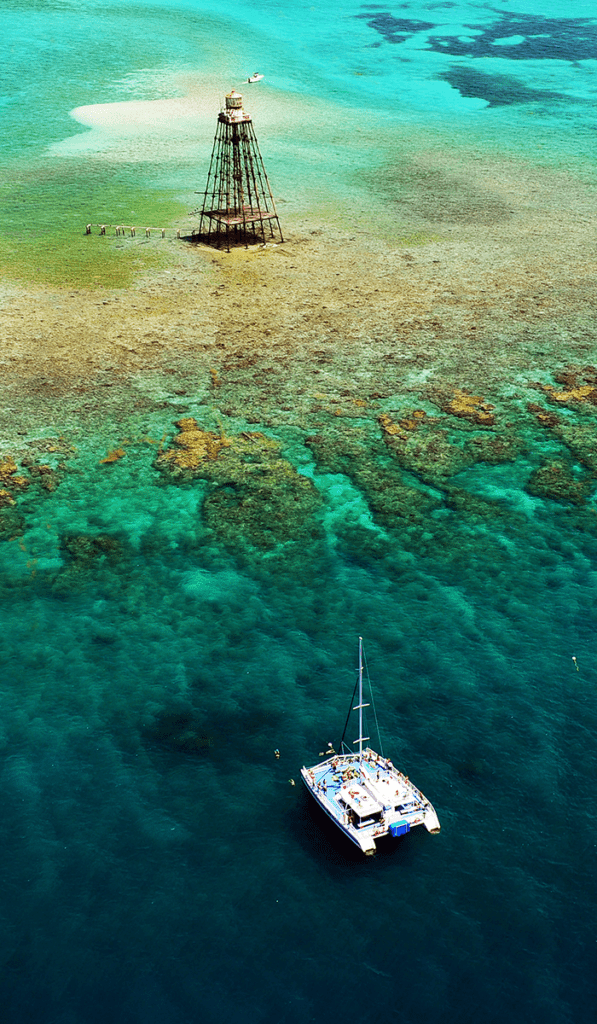 Snorkeling boats in the Florida Keys allow for visitors to visit popular snorkeling sights, like the Sombrero Key Light and the rich coral system that surrounds it.